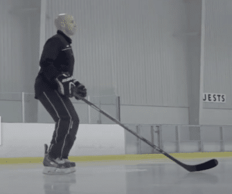 Dwayne demonstrating proper hockey player position